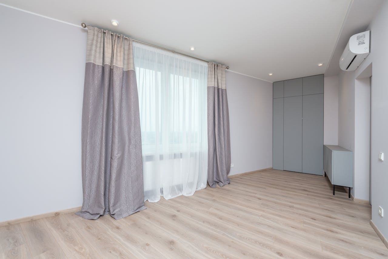 gallery-1 Modern room interior with cabinet and closet on floor under air conditioning and lamps in light house